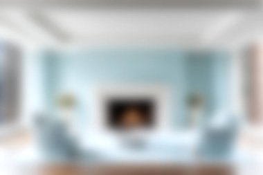 Açık mavi duvarlar ve zevkli mobilyalar sergilenen sakin bir oturma odası. Odada bir şömine var, sıcaklığı ve rahatlığı davet ediyor, rahatlama ve toplanma için ideal..