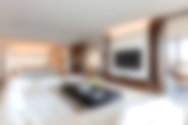 Modern bir oturma odası. Minimalist dekorla parlak doğal ışık saçıyor. Modern bir ev ortamında rahatlama ve şık toplantılar için mükemmel..