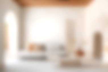 Yumuşak nötr tonlar, sıcak ışıklandırma ve rahatlama ve tarz için mükemmel davetkar bir atmosfer içeren sakin, modern bir minimalist oturma odası..