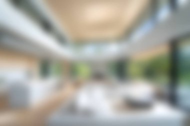 Sıcak günbatımı ışığının geniş pencerelerden içeri aktığı samimi, modern bir kafe sahnesi. Atmosfer rahatlamaya ve sosyalleşmeye davetiye çıkarır. Yaşam tarzı temaları için mükemmel.