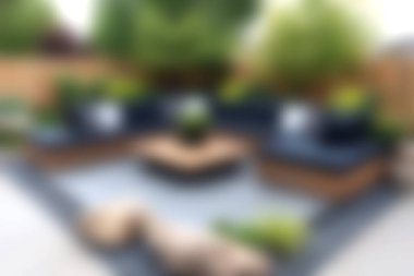 A beautifully arranged outdoor relaxation space featuring comfortable seating and lush greenery, perfect for enjoying serene moments in a modern garden setting.