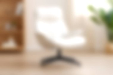 A stylish modern white swivel chair placed in a bright interior space with soft lighting and greenery. Perfect for adding comfort and elegance to any room.