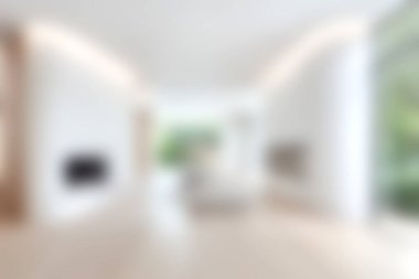 Bright modern living room featuring minimalist decor, soft furniture, and ample natural light creating a serene ambiance perfect for relaxation.