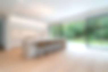 A modern kitchen featuring a bright and airy atmosphere with natural light streaming in. The minimalist design highlights the elegance of contemporary living spaces.