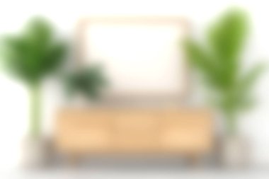 A serene living room featuring a soft couch, indoor plants, and minimalistic decor. Ideal for creating a cozy and inviting atmosphere in any home setting.