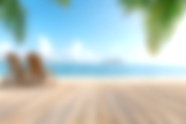 Huzurlu bir plaj sahnesinin tadını çıkarın. Salon sandalyeleri, berrak mavi gökyüzü ve dinlenmek ve tatil planlamak için ideal, yumuşak okyanus dalgaları..