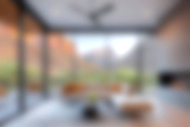 Nefes kesici dağ manzaraları sunan, sakin ve davetkar bir atmosfer yaratan çarpıcı bir modern minimalist iç mekan..