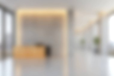 Modern bir resepsiyon alanı hafif ışıklandırma, ahşap tezgah ve çağdaş ofisler için ideal geniş atmosferli minimalist tasarım elementleri sergiliyor..