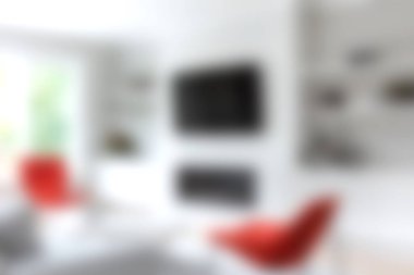 Parlak ve davetkar bir oturma odası şık kırmızı sandalyeler, minimalist dekorlar ve rahat bir atmosfer. Modern ev estetiği ve rahatlığı için ideal..