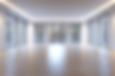 Bu görüntü, boşluğu doğal ışıkla dolduran geniş pencereli modern boş bir oda yakalıyor. İç tasarım kavramları için ideal oda, temiz çizgileri ve nötr renkleri olan minimalist bir tasarım sergiliyor..