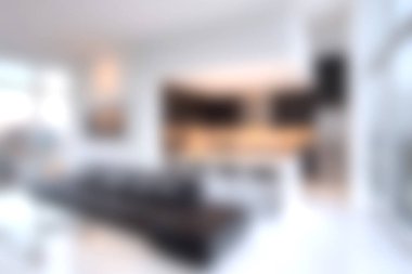 Parlak ışıklandırmalı ve şık mobilya tasarımlı modern bir minimalist oturma odası keşfedin. Mekan temiz bir estetik ile rahat bir atmosfer sunuyor..