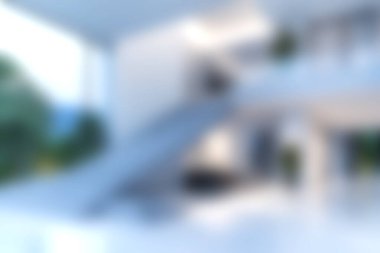 Bu resim, parlak ve davetkar bir atmosfer yaratarak, bir merdiven ve açık kat düzeniyle modern bir minimalist iç mekan sergiliyor..