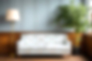 Bu rahat minimalist oturma odasında beyaz bir kanepe ve iç mekan bitkisiyle tamamlanmış modern bir dekor var. Rahatlamak için mükemmel sakin bir atmosfer yaratıyor..