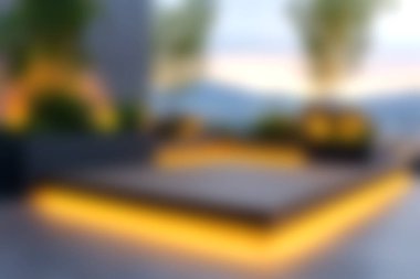 Rahatlamak ve keyif almak için tasarlanmış, sıcak LED ışıklandırmalı modern bir açık hava terası. Huzurlu ortam mükemmel bir gün batımı manzarası sunuyor..