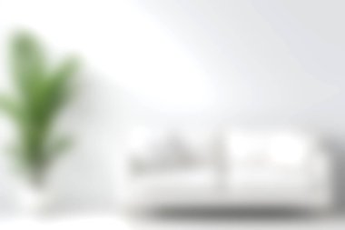 Dekoratif yeşil bir bitki tarafından tamamlanmış beyaz bir kanepe sergilenen parlak ve havadar bir oturma odası. Doğal ışık boşluğu suyla doldurur, rahat ve davetkar bir atmosfer yaratır..