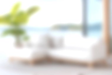 Rahatlamak ve rahatlamak için tasarlanmış beyaz bir kanepe ve yemyeşil bir tropikal bitki içeren parlak ve havadar bir sahil yaşam alanı. Güneş ışığı odayı dolduruyor ve yaz tatili için mükemmel bir ortam yaratıyor..