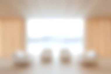 Yumuşak mobilyalar, geniş pencereler ve doğal bir manzaraya sahip parlak ve havadar modern iç mekan, rahatlık ve yaşam tarzı için rahat ve rahatlatıcı bir alan yaratıyor..