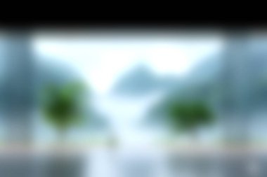 Puslu dağların ve yemyeşil yemyeşil suların bulunduğu sakin bir manzara, doğa sahnelerinde huzur ve rahatlığı çağrıştırmak için mükemmel..