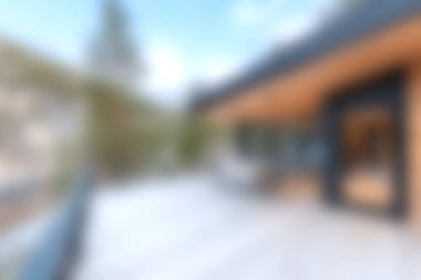 Ağaçlarla çevrili, rahatlama ve rahatlama için mükemmel, modern mimari sergilenen güzel bir veranda. Tatil evleri ve huzur içinde yaşamak için ideal..