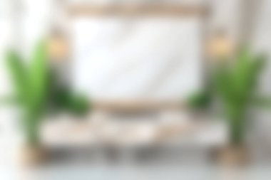 Parlak ve havadar oturma odası, klasik dekorlar, büyük yeşil bitkiler, ve davetkar bir atmosfer, rahatlama ve estetik cazibe için mükemmel..