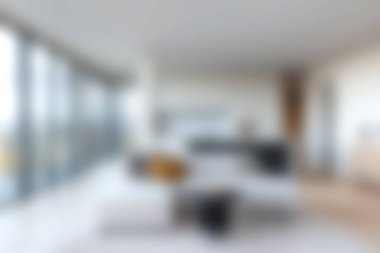 Parlak ve ferah oturma odası, bol doğal ışık, rahat mobilyalar ve rahatlama ve şık yaşam için ideal sakin bir atmosfere sahip modern minimalist bir tasarıma sahip..