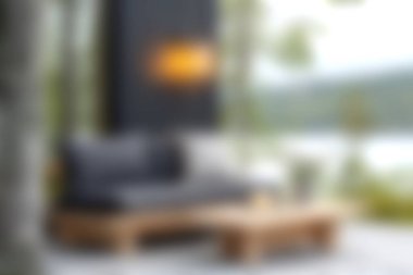 Bu resim, sakin deniz manzaralı modern mobilyaların yer aldığı rahat bir açık hava oturma alanı sergiliyor. Sakin anlar için mükemmel..