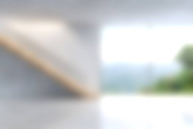 Bu resim, asgari tasarım ve bol doğal ışık ile karakterize edilmiş modern bir iç mekan sergiliyor, sakin ve davetkar bir atmosfer yaratıyor..