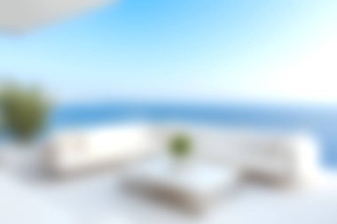 Serin bir açık hava alanı deneyin. Sersemletici bir deniz manzarası ve parlak bir gökyüzü ile rahat bir oturma alanı, rahatlatıcı bir atmosfer oluşturur..