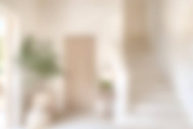 Hafif renklere sahip modern bir iç tasarımı, minimalist estetiği ve ev dekorasyonu için ideal barışçıl ambiyansı gösteren yumuşak odaklı bir resim..