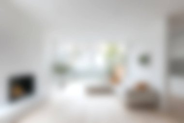 Parlak ve rahat minimalist bir oturma odası bol miktarda doğal ışık, modern dekor ve sakin ve şık bir atmosfer yaratan mobilya unsurları barındırıyor..