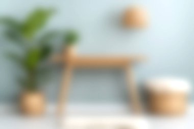 Sergilenen sakin ve modern bir çalışma alanı minimalist bir masa, güzel bir kapalı bitki ve yumuşak renk paleti üretkenlik ve yaratıcılık için sakinleştirici bir atmosfer yaratıyor..