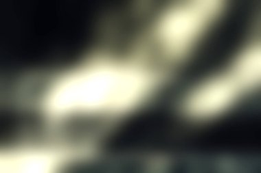 Bu resim, tek renkli tonlarda modern bir estetik gösteren, karmaşık gölgeler ve ışık desenleriyle soyut dokulu bir duvara sahiptir. Sanatsal projeler için mükemmel.