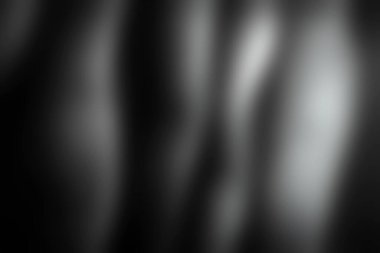 Bu soyut resim siyah beyaz sıvı dalgaları sergiliyor, yumuşak ışık ve doku ile geliştirilmiş, tasarımında gizem ve zarafeti çağrıştırıyor..