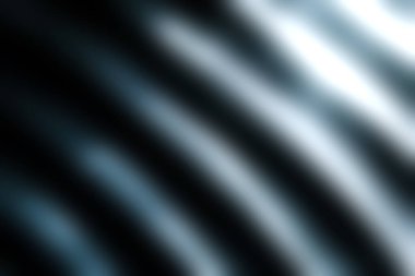 Bu soyut yakın plan resim düz kıvrımlı ve karmaşık dokulara sahip parlak metalik yüzeyler sergiliyor ve görsel olarak çarpıcı bir kompozisyon oluşturuyor. Modern tasarım projeleri için mükemmel.