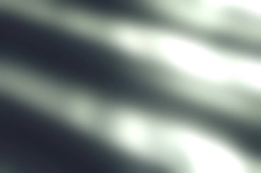 Bu resim, soyut desenler ve yumuşak dokular sergileyerek bir yüzeydeki ışık ve gölgenin büyüleyici etkileşimini yakalar. Nazik aydınlanma, modern dekorasyon için mükemmel bir huzur hissi katıyor..