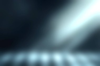 Bu görüntü, boş bir karanlık arkaplan boyunca uzanan yumuşak bir ışık ışını yakalar ve atmosferik ve huzurlu bir ortam yaratır. Sanatsal ve yaratıcı projeler için ideal.