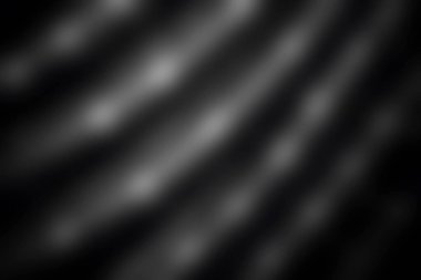 Bu zarif siyah ve beyaz görüntü yumuşak kıvrımlar ve bokeh efektleri içerir, sakin ve modern bir arkaplan oluşturur. Çeşitli tasarım projeleri için mükemmel.