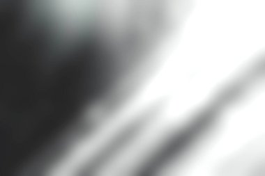 Büyüleyici ışık ışınları, yumuşak tek renkli arka planda parlıyor. Parıltı ve bokeh efektleriyle büyülü bir atmosfer yaratıyor. Sanatsal projeler için mükemmel.