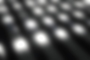 Bu soyut görüntü, sanatsal ve modern tasarım projeleri için ideal, karmaşık çizgiler ve ince çizgiler sergilenen desenli bir metal yüzeyin yakın çekimini yakalar..