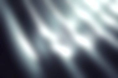 Yumuşak ışık zarif perde kumaşından süzülür, zarif desenler ve gölgeler bırakır, herhangi bir iç mekanda huzurlu ve sakin bir atmosfer yaratır..