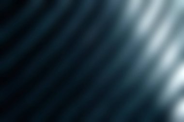 Bu soyut görüntü, ışık ve gölgenin dramatik etkileşimini gösteren, metalik gölgelerdeki parlak ve kıvrımlı çizgilere sahiptir. Sanatsal projeler için mükemmel.