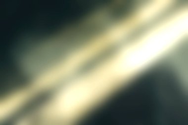 Bu resim, ince tanecikleri ve kusurları vurgulayarak büyüleyici bir görsel derinlik yaratan, desenli beton yüzeydeki ışık ve gölgenin etkileşimini gösteriyor..