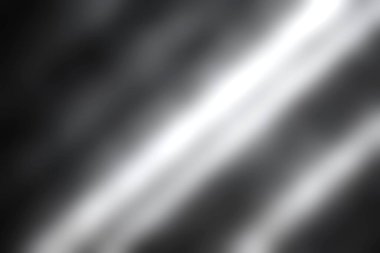 Bu soyut resim köşegen ışık ışınlarını, desenli karanlık bir yüzeye gölge düşürerek modern tasarım için minimalist ve sanatsal bir kompozisyon oluşturur..