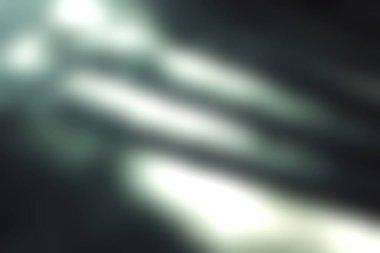 Yumuşak ışık ve gölgelerle aydınlatılan beton merdivenlerin yakın görüntüsü soyut ve sakin bir ortam yaratıyor, sanatsal ve mimari temalar için mükemmel..