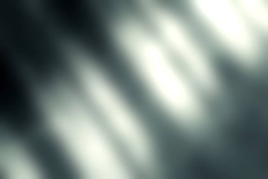 Bu resim, modern sanatsal bir ekran için çarpıcı tek renkli tonları gösteren, desenli bir yüzeyde soyut gölgeler oluşturur..