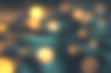 Bu soyut arkaplanla parıldayan ışıkların büyüleyici güzelliğini yakalayın ve renkli bokeh parçacıklarının sihirli bir görüntüsünü gösterin..