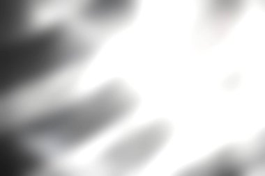 Bu görüntü, yumuşak ışıkla aydınlatılan beyaz kumaş akışını ve soyut bir desen oluşturur. Yumuşak dokular ve yumuşak dalgalar bir zarafet ve sükunet hissi uyandırıyor..