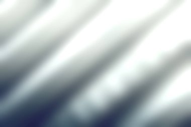 Yumuşak mavi ve gri tonlu soyut bir resim dikey çizgiler sergiliyor ve çarpıcı bir ışık ve gölge etkileşimi yaratıyor..