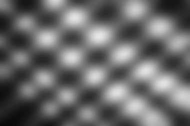 Bu görüntü ışık ve gölgenin etkileşimini yakalar, dokulu bir yüzeyde çarpıcı desenler yaratır. Modern tasarım ve sanat temaları için mükemmel bir uyum..