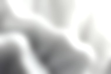 Bu soyut yakın çekim, zarif ve pürüzsüz bir doku oluşturan, minimalist tasarımlar ve yaratıcı projeler için mükemmel beyaz dalgalı desenler sergiliyor..